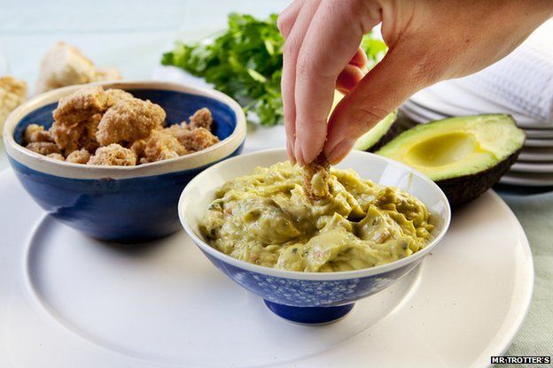Scratchings and guacamole dip