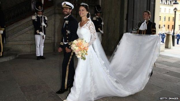 Prince Carl Philip of Sweden is seen with his new wife Princess Sofia of Sweden after their marriage ceremony (13 June 2015)