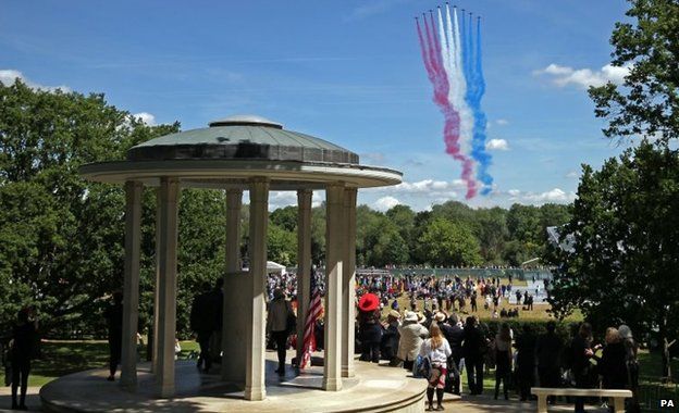 The Red Arrows fly over the Magna Carta memorial at Runnymede, near Egham, Surrey, during the 800th anniversary