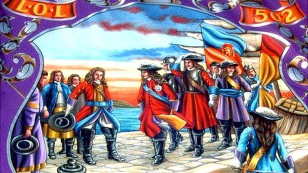 This banner depicts William of Orange arriving at Carrickfergus, in what is now Northern Ireland. He brought with him the largest invasion force Ireland has ever seen and used it to defeat James II at the Battle of the Boyne.