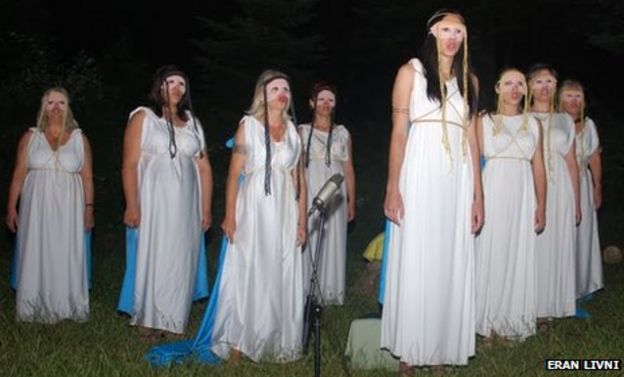 Worshippers take part in a play on Mount Olympus