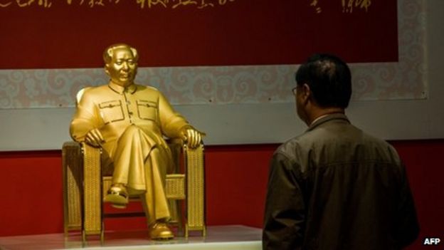 A gold and jade statue of Mao Zedong displayed at an exhibition in Shenzhen, southern China, in December 2013