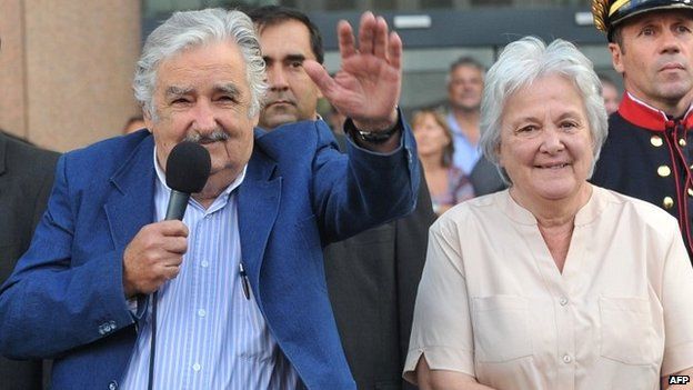 Uruguayan President Jose Mujica with his wife Lucia Topolansky during a farewell ceremony in Montevideo - 27 February 2015