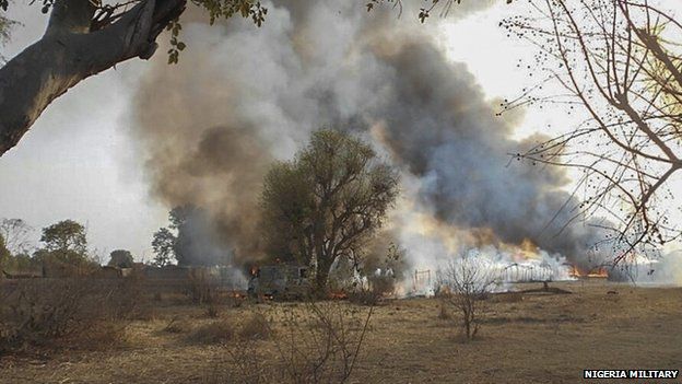 A handout picture dated 3 May 2015 released by the Nigerian army shows a Boko Haram camp being destroyed in the Sambisa forest, Borno state, Nigeria