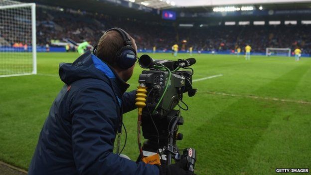 Television cameraman films the action during the Premier League match between Leicester City and Crystal Palace at the King Power Stadium
