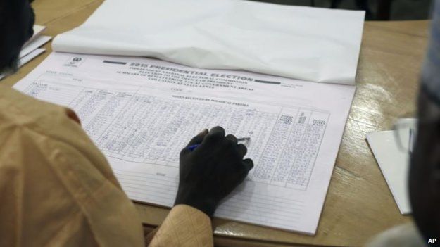 A Nigerian election official reads local results in Kaduna, Nigeria on 30 March, 2015