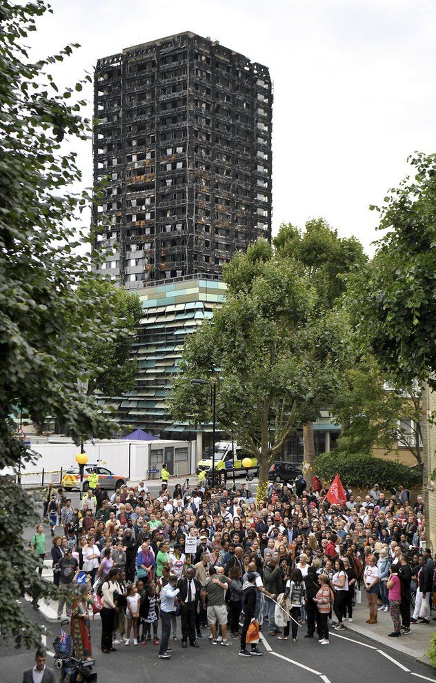Friends and relatives of victims of the Grenfell Tower fire joined local residents for a silent march to mark the second month since the disaster