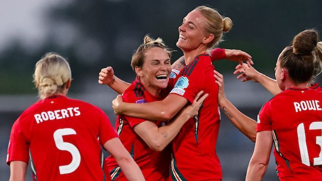 Wales forward Jess Fishlock celebrates with Rhiannon Roberts, Sophie Ingle and Rachel Rowe