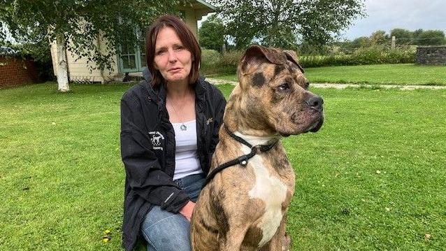 woman and large dog