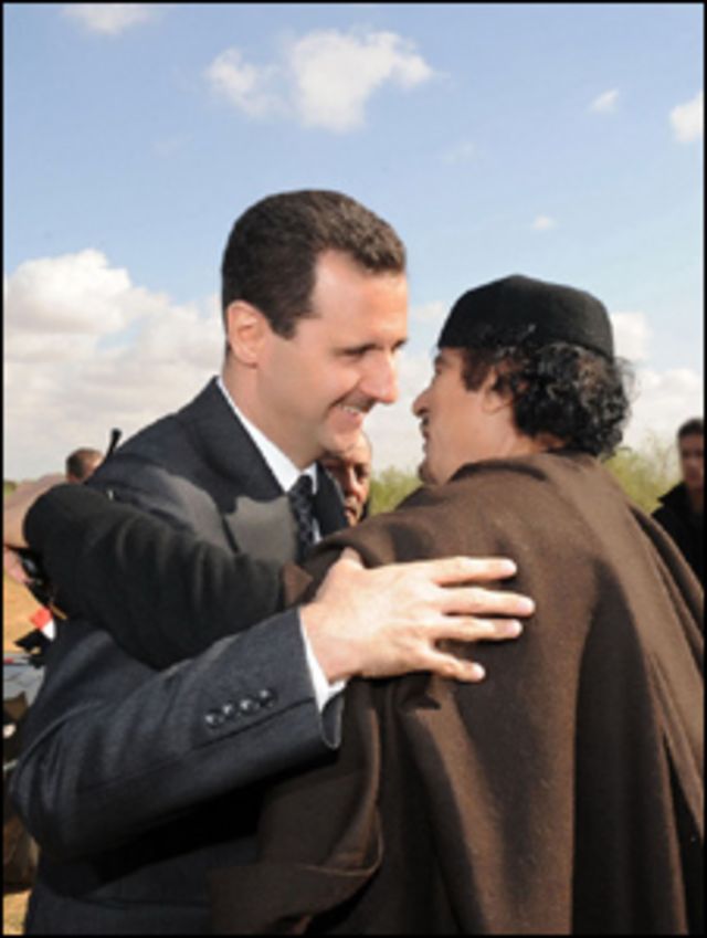 الأسد والقذافي في ليبيا