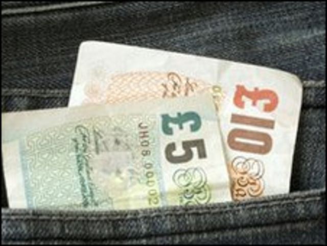pound bank note in the pocket