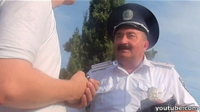 Інспектор ДАІ і власник "Дорожнього контролю"