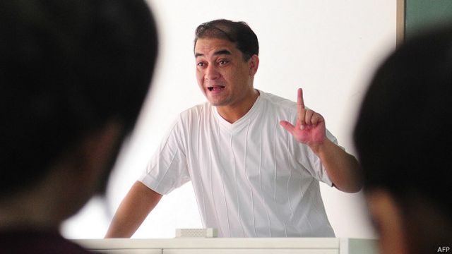 伊力哈木•土赫提在北京講課(資料圖片)