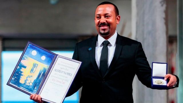 Abiy Ahmed Ali with the Nobel Peace Prize