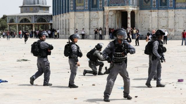 Israeli police stand in position at the compound that houses the al-Aqsa Mosque