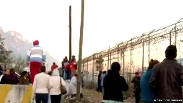 People outside Topo Chico prison