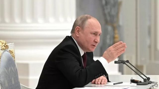 путін