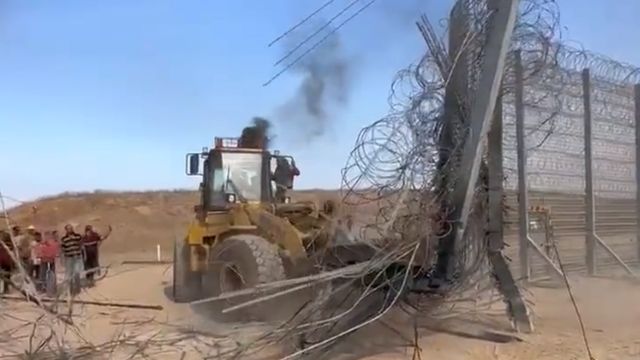 Bulldozer destroys section of Gaza barrier