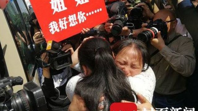 Kang Ying and her mother Liu Dengying hug after being reunited