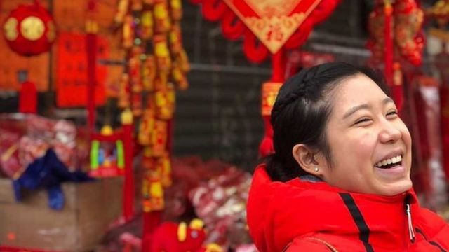 Stephanie wears red during the Chinese New Year period.