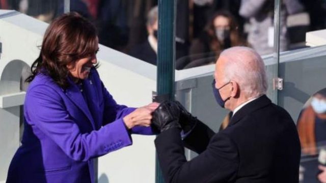 Kamala Harris and Joe Biden during di inauguration