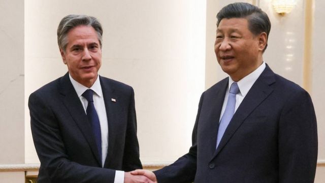 US Secretary of State Antony Blinken (L) shakes hands with China's President Xi Jinping at the Great Hall of the People in Beijing on June 19, 2023.