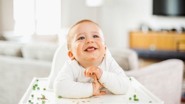 Feeding your baby solids early may help them sleep, study suggests