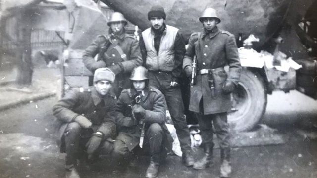 Traian Rabagia (centre, top) aged 19 in Bucharest, days after Ceausescu fled, spending time with some of his military service colleagues who days before he faced down in the streets