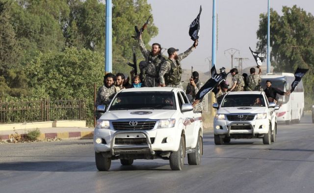 People waving black flags