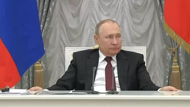 путін
