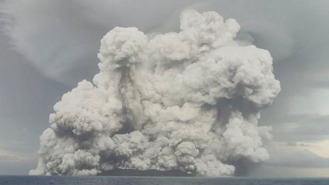 An eruption occurs at the Hunga Tonga-Hunga Ha'apai submarine volcano off Tonga on January 14, 2022 in this screenshot obtained from a social media video.