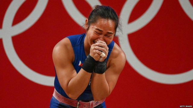 Hidilyn Diaz celebrates an emotional win at the Tokyo 2020 Olympics.