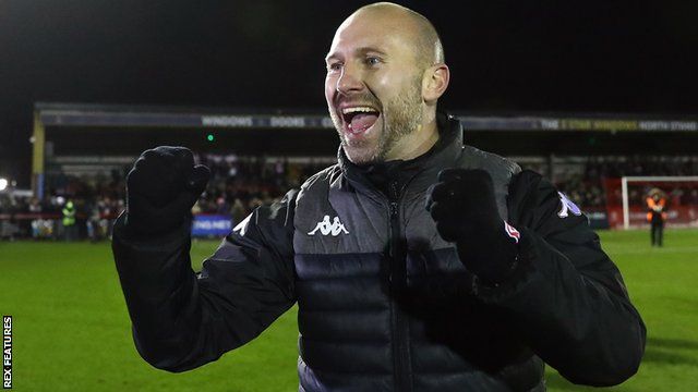 Kidderminster Harriers manager Russell Penn celebrates after his side's win over Halifax in the FA Cup second-round