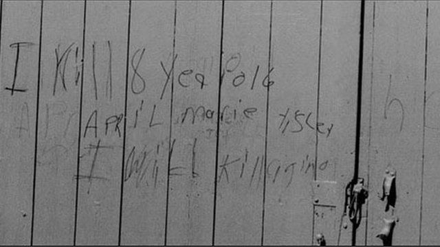 "I kill 8 year old April Marie Tisley I will kill agin" written on a barn