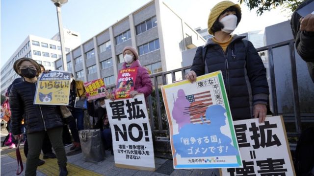 Demonstrators protest against the Japanese government's plans to increase military spending.