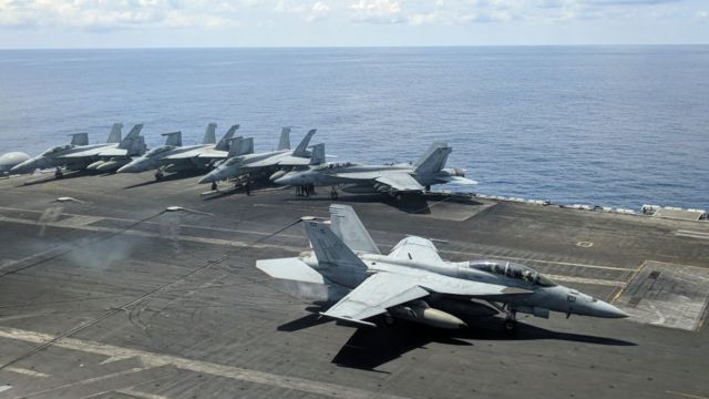 The F/A-18 Super Hornet on the deck of the USS Ronald Reagan
