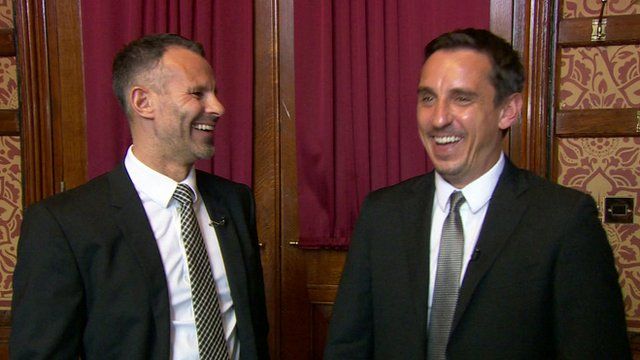 Ryan Giggs and Gary Neville laughing