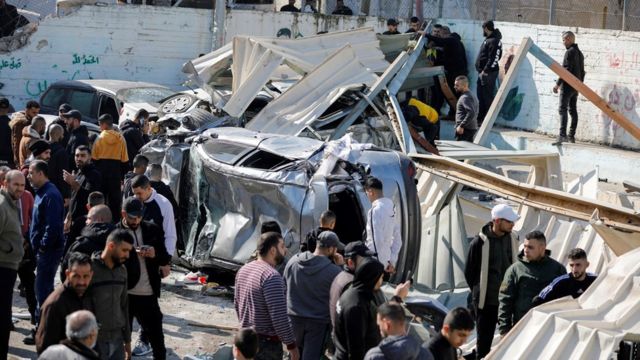 Palestinians in Jenin following the raid.