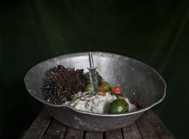 Metal bowl containing food