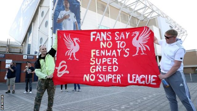 Fans protest outside Elland Road stadium against Liverpool's decision to be included amongst the clubs attempting to form a new European Super League