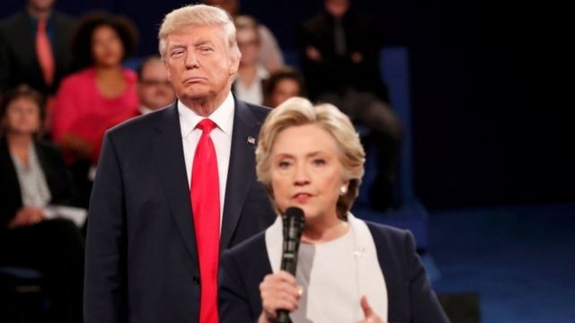 Donald Trump stares at Hillary Clinton during a debate.