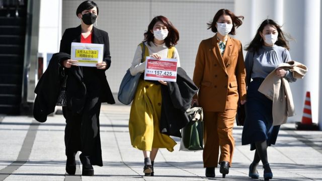 Momoko Nojo walking with other female signatories