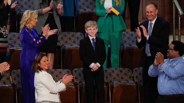 The boy Joshua Davis from Midlothian, Virginia applauded during the State of the Union address