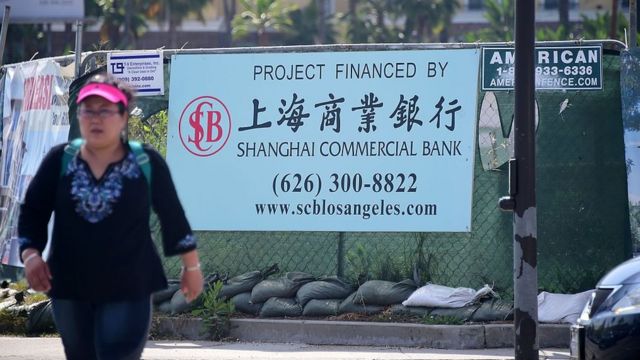 A Chinese bank real estate investment sign with Chinese letters in San Gabriel California.