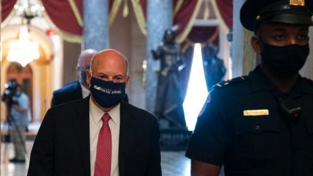 Louise DeJoy walks through the US Capitol building
