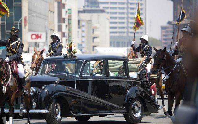 Zimbabwean President Robert Mugabe (seated R) and his wife Grace Mugabe (L) arrive aboard a vintage Rolls Royce before the official opening of the Fourth Session of the Eighth Parliament of Zimbabwe in Harare, Zimbabwe, 12 September 2017. The Fifth Session will be the last before the 2018 elections of which the date is yet to be set.
