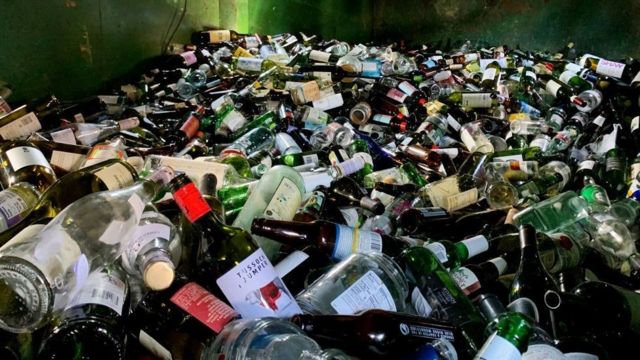 A bin full of empty bottles