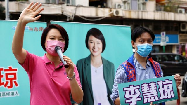 Starry Lee, Chairwoman of the biggest pro-establishment Democratic Alliance for the Betterment and Progress of Hong Kong (DAB), gestures to supporters during the Legislative Council election campaign, in Hong Kong, China, November 7, 2021.