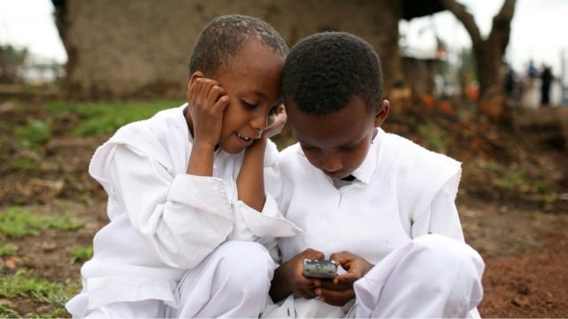 kids playing with a phone