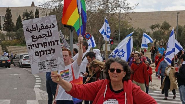 LGBT flag inside the protests in Israel.